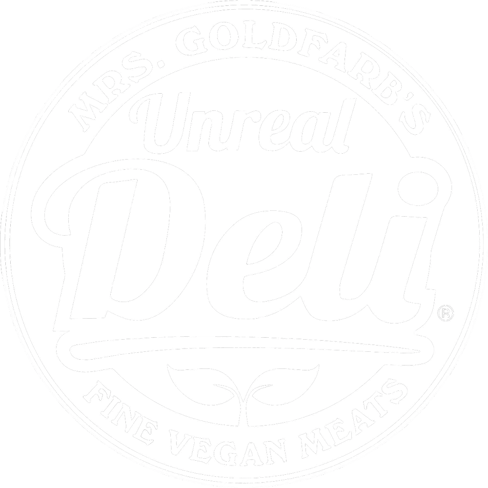 Unreal Deli logo white