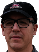 Man With Glasses and a Hat Thinking