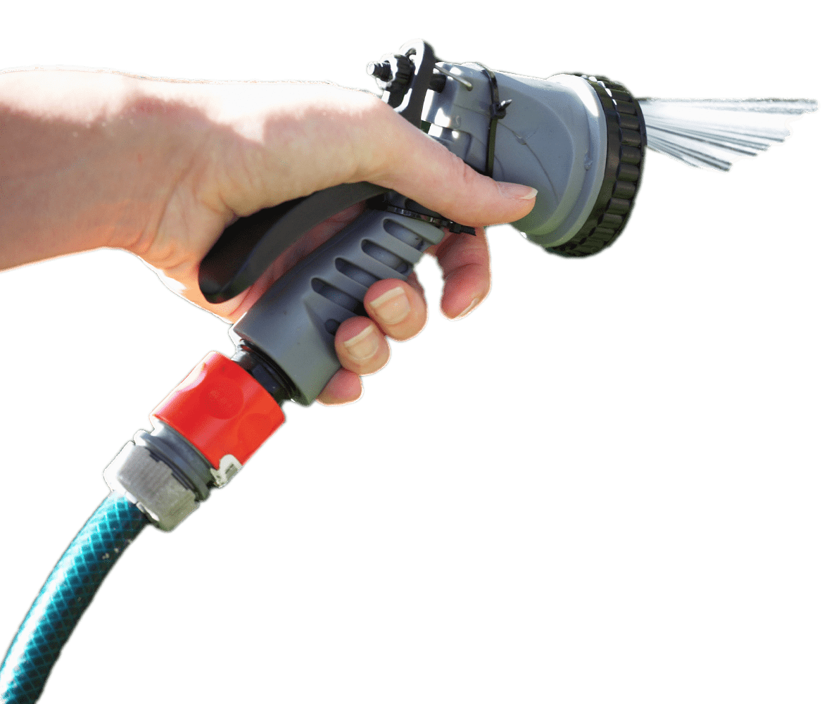 Woman Using A Garden Hose