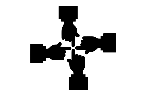 Fingers Pointing Towards the Same Spot