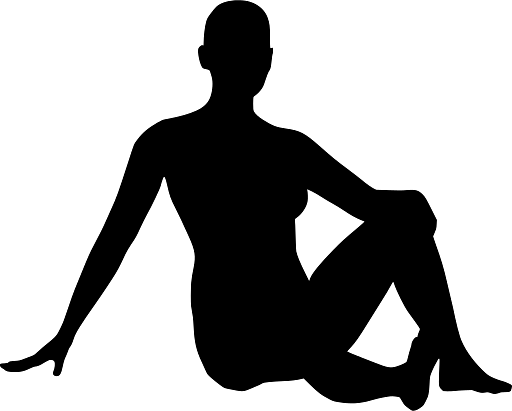 Silhouette of a Woman in Seated Yoga Pose