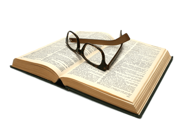 Glasses on Top Of Open Book