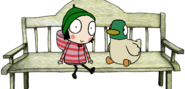 Sarah & Duck Sitting on A Bench