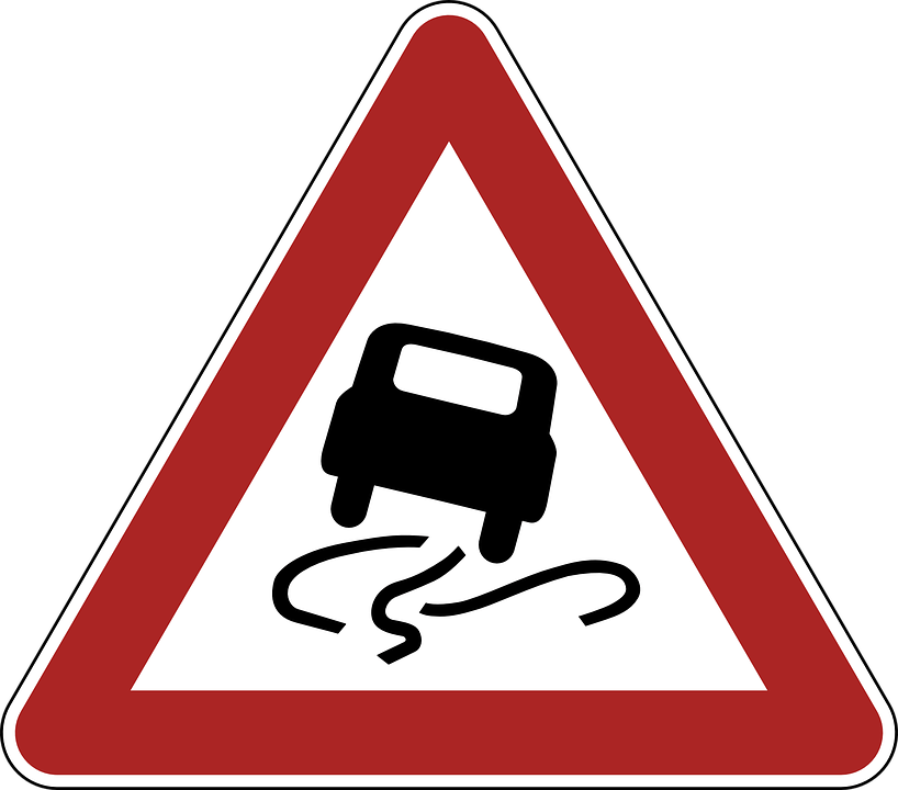 Slippery Road Warning Sign