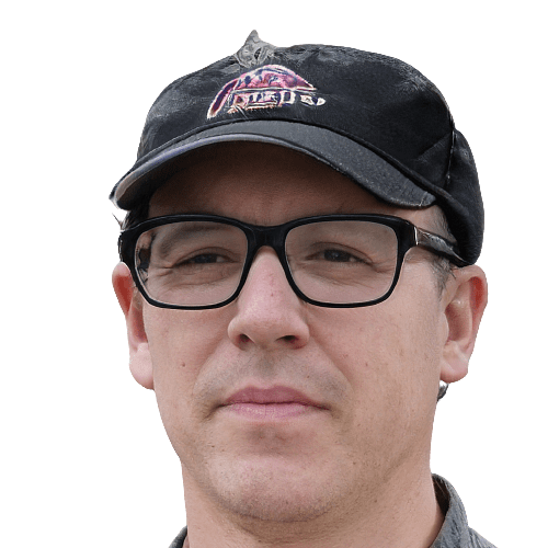 Man With Glasses and a Hat Thinking