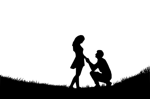 Man Going Down on One Knee for Marriage Proposal