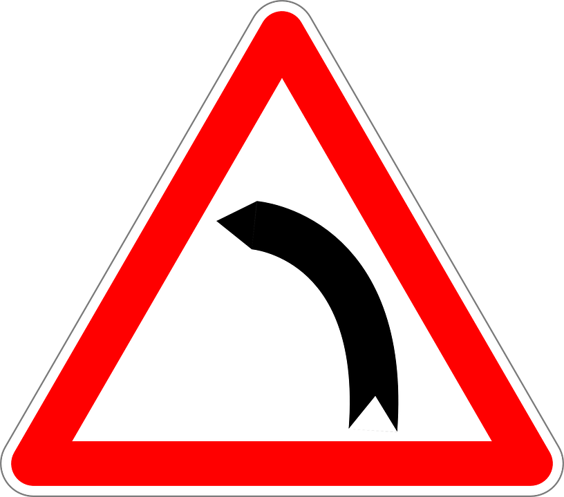 Dangerous Curse To Left Road Sign