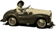Vintage Photo Of A Kid In Toy Car