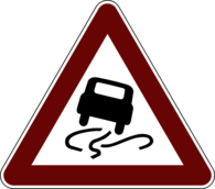 Slippery Road Warning Sign